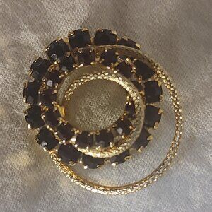 Ladies brooch, Gold, Unique, vintage, red rhinestones, unsigned Van Del, spiral